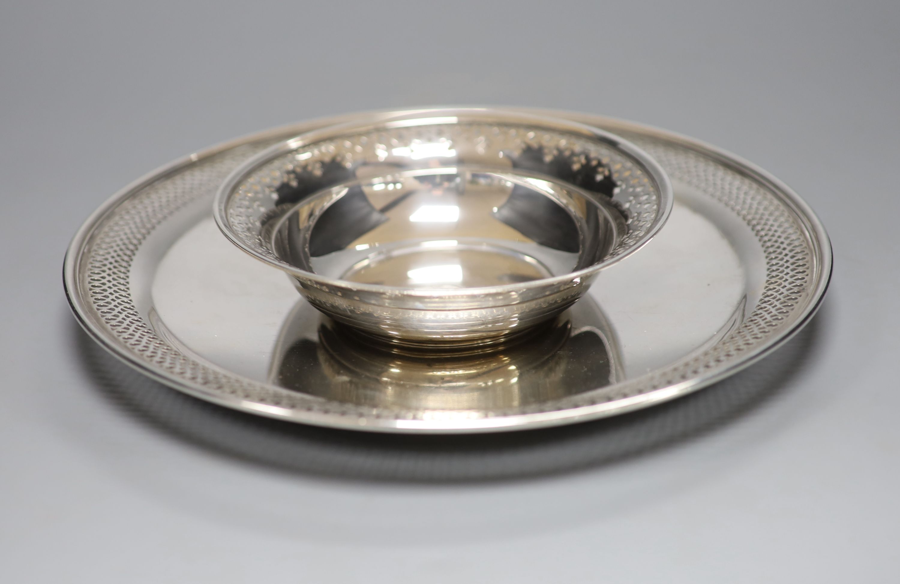 An early to mid 20th century Tiffany & Co sterling platter, 27.2cm and bowl, with pierced borders